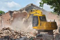 因历史原因未办理产权证的房屋，不宜以系违法建筑为由不予补偿